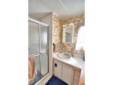 PRICE IMPROVEMENT...WELCOME TO YOUR FLORIDA RETIREMENT OASIS IN on Southern Dunes Golf and Country Club in Florida - for sale on GolfHomes.com, golf home, golf lot