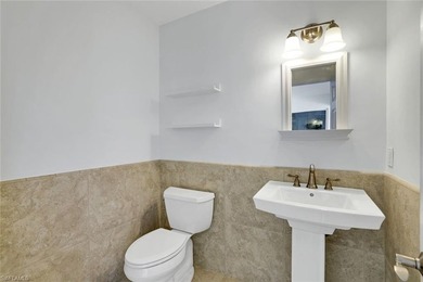 Situated on more than half an acre in the Imperial Golf Estates on Imperial Golf Club in Florida - for sale on GolfHomes.com, golf home, golf lot