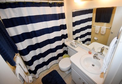 Rarely available ground floor end unit. Easy access to Sharkey's on Lake Venice Golf Club in Florida - for sale on GolfHomes.com, golf home, golf lot