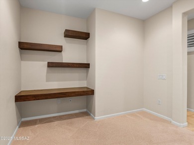 Enjoy sweeping panoramic vistas of the adjacent common area on Saddlebrooke Ranch Golf Club in Arizona - for sale on GolfHomes.com, golf home, golf lot