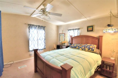 PRICE IMPROVEMENT...WELCOME TO YOUR FLORIDA RETIREMENT OASIS IN on Southern Dunes Golf and Country Club in Florida - for sale on GolfHomes.com, golf home, golf lot