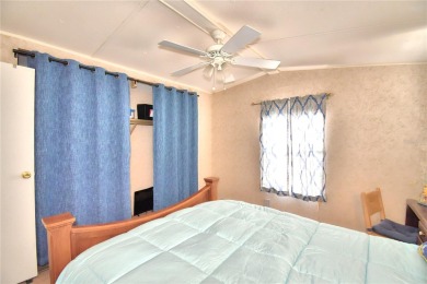 PRICE IMPROVEMENT...WELCOME TO YOUR FLORIDA RETIREMENT OASIS IN on Southern Dunes Golf and Country Club in Florida - for sale on GolfHomes.com, golf home, golf lot