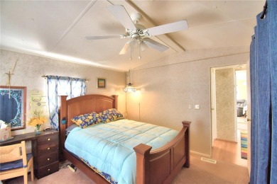PRICE IMPROVEMENT...WELCOME TO YOUR FLORIDA RETIREMENT OASIS IN on Southern Dunes Golf and Country Club in Florida - for sale on GolfHomes.com, golf home, golf lot