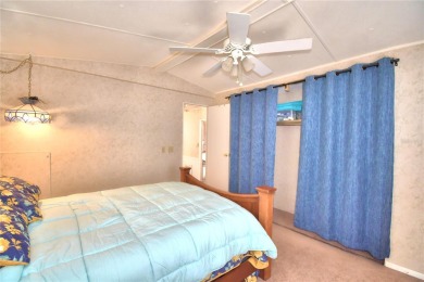PRICE IMPROVEMENT...WELCOME TO YOUR FLORIDA RETIREMENT OASIS IN on Southern Dunes Golf and Country Club in Florida - for sale on GolfHomes.com, golf home, golf lot