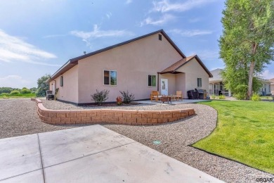 Nestled in the picturesque Cattails Golf Course community in on Cattails Golf Club in Colorado - for sale on GolfHomes.com, golf home, golf lot