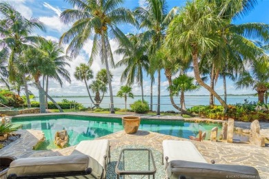 This spectacular waterfront estate is located on nearly an acre on Sailfish Point Golf Club, Inc. in Florida - for sale on GolfHomes.com, golf home, golf lot