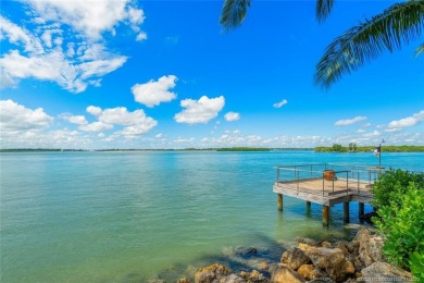 This spectacular waterfront estate is located on nearly an acre on Sailfish Point Golf Club, Inc. in Florida - for sale on GolfHomes.com, golf home, golf lot