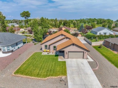 Nestled in the picturesque Cattails Golf Course community in on Cattails Golf Club in Colorado - for sale on GolfHomes.com, golf home, golf lot