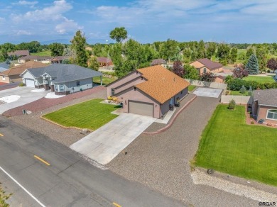 Nestled in the picturesque Cattails Golf Course community in on Cattails Golf Club in Colorado - for sale on GolfHomes.com, golf home, golf lot