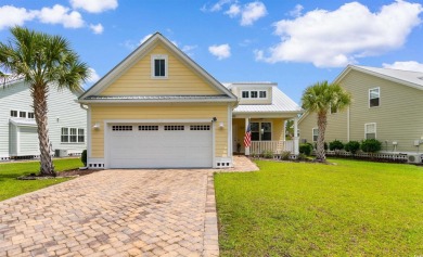 Welcome to 323 Waties Drive, a beautifully maintained 3-bedroom on TPC Myrtle Beach Golf Club in South Carolina - for sale on GolfHomes.com, golf home, golf lot