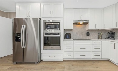 Beach living at its best!  Nestled in the highly sought-after on Pasadena Yacht and Country Club in Florida - for sale on GolfHomes.com, golf home, golf lot