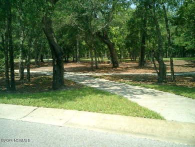 Lovely half acre lot in Seascape backing up to natural area on Lockwood Folly Country Club in North Carolina - for sale on GolfHomes.com, golf home, golf lot