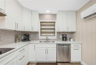 Beach living at its best!  Nestled in the highly sought-after on Pasadena Yacht and Country Club in Florida - for sale on GolfHomes.com, golf home, golf lot