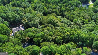 Tucked inside the gated Orchard Golf & Country Club, this 1 on The Orchard Golf and Country Club in Georgia - for sale on GolfHomes.com, golf home, golf lot