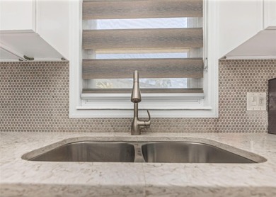 Beach living at its best!  Nestled in the highly sought-after on Pasadena Yacht and Country Club in Florida - for sale on GolfHomes.com, golf home, golf lot