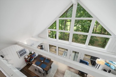 Live where every day feels like a getaway! This charming villa on Keowee Key Golf and Country Club in South Carolina - for sale on GolfHomes.com, golf home, golf lot