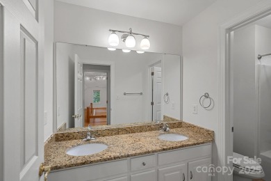 Welcome to this exquisite full-brick home in coveted Shannamara on The Divide Golf Club in North Carolina - for sale on GolfHomes.com, golf home, golf lot