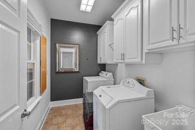 Welcome to this exquisite full-brick home in coveted Shannamara on The Divide Golf Club in North Carolina - for sale on GolfHomes.com, golf home, golf lot