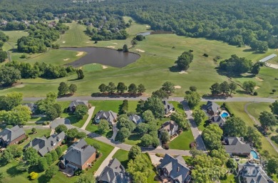 Welcome to this exquisite full-brick home in coveted Shannamara on The Divide Golf Club in North Carolina - for sale on GolfHomes.com, golf home, golf lot