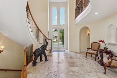 Experience three fully finished levels of exceptional living on The Golf Club of Georgia in Georgia - for sale on GolfHomes.com, golf home, golf lot
