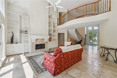 Experience three fully finished levels of exceptional living on The Golf Club of Georgia in Georgia - for sale on GolfHomes.com, golf home, golf lot