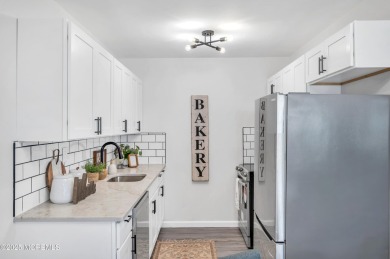 Immaculately renovated end-unit gem in the gated Leisure Village on Greenbriar Woodlands in New Jersey - for sale on GolfHomes.com, golf home, golf lot