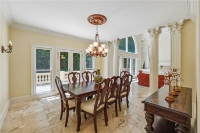 Experience three fully finished levels of exceptional living on The Golf Club of Georgia in Georgia - for sale on GolfHomes.com, golf home, golf lot