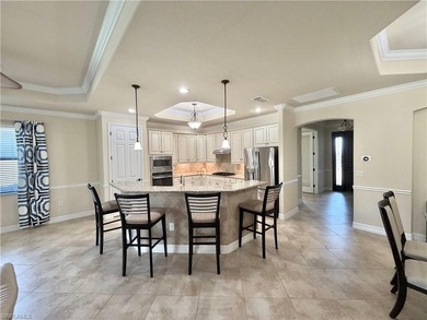 Luxury Living in Fiddler's Creek This beautifully appointed 3 on The Golf Club At Fiddlers Creek in Florida - for sale on GolfHomes.com, golf home, golf lot