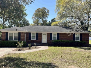 Welcome to this charming 3-bedroom, 2-bath brick ranch located on Beachwood Golf Club in South Carolina - for sale on GolfHomes.com, golf home, golf lot