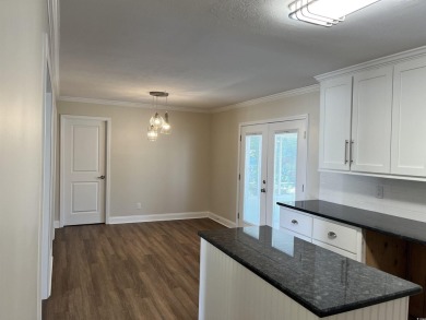 Welcome to this charming 3-bedroom, 2-bath brick ranch located on Beachwood Golf Club in South Carolina - for sale on GolfHomes.com, golf home, golf lot