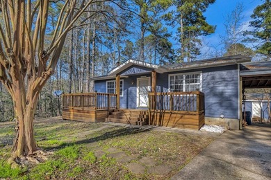 Nestled within minutes of the tranquil waters of Lake Sam on Rayburn Country Club in Texas - for sale on GolfHomes.com, golf home, golf lot