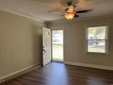 Welcome to this charming 3-bedroom, 2-bath brick ranch located on Beachwood Golf Club in South Carolina - for sale on GolfHomes.com, golf home, golf lot