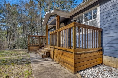 Nestled within minutes of the tranquil waters of Lake Sam on Rayburn Country Club in Texas - for sale on GolfHomes.com, golf home, golf lot