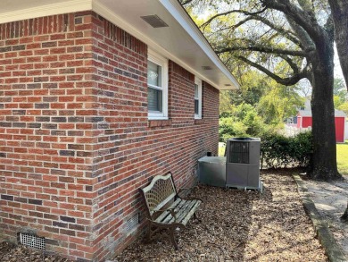 Welcome to this charming 3-bedroom, 2-bath brick ranch located on Beachwood Golf Club in South Carolina - for sale on GolfHomes.com, golf home, golf lot