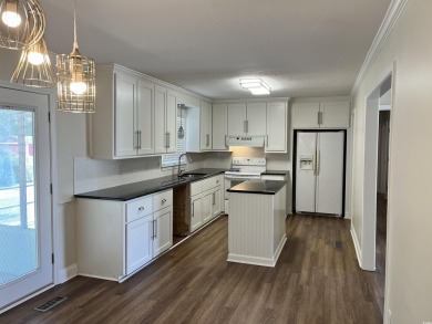 Welcome to this charming 3-bedroom, 2-bath brick ranch located on Beachwood Golf Club in South Carolina - for sale on GolfHomes.com, golf home, golf lot