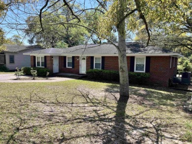 Welcome to this charming 3-bedroom, 2-bath brick ranch located on Beachwood Golf Club in South Carolina - for sale on GolfHomes.com, golf home, golf lot