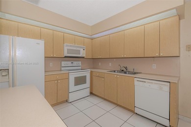 WELL PRICED 1st FLOOR CORNER UNIT in Century Village with 1,507 on Flamingo Lakes Country Club in Florida - for sale on GolfHomes.com, golf home, golf lot