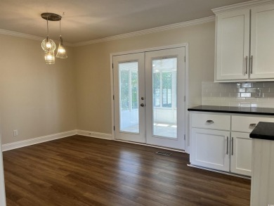 Welcome to this charming 3-bedroom, 2-bath brick ranch located on Beachwood Golf Club in South Carolina - for sale on GolfHomes.com, golf home, golf lot