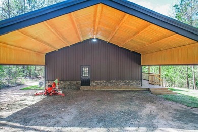 This new construction barndominium in Rayburn Country offers 3 on Rayburn Country Club in Texas - for sale on GolfHomes.com, golf home, golf lot