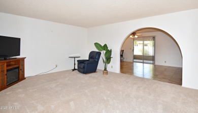 This Bright, Cheerful, & Upgraded Open-Plan Home is Tucked Away on Sunland Village East Golf Course in Arizona - for sale on GolfHomes.com, golf home, golf lot