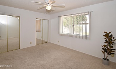This Bright, Cheerful, & Upgraded Open-Plan Home is Tucked Away on Sunland Village East Golf Course in Arizona - for sale on GolfHomes.com, golf home, golf lot