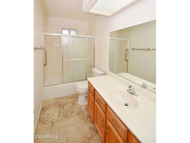 This Bright, Cheerful, & Upgraded Open-Plan Home is Tucked Away on Sunland Village East Golf Course in Arizona - for sale on GolfHomes.com, golf home, golf lot
