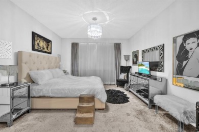 WAKE UP TO SERENE GARDEN VIEWS & INDULGE IN RESORT STYLE on TPC Eagle Trace in Florida - for sale on GolfHomes.com, golf home, golf lot