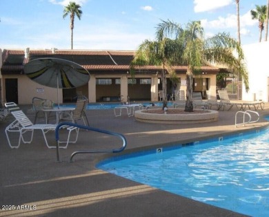 This Bright, Cheerful, & Upgraded Open-Plan Home is Tucked Away on Sunland Village East Golf Course in Arizona - for sale on GolfHomes.com, golf home, golf lot