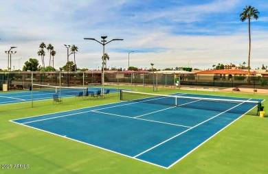This Bright, Cheerful, & Upgraded Open-Plan Home is Tucked Away on Sunland Village East Golf Course in Arizona - for sale on GolfHomes.com, golf home, golf lot