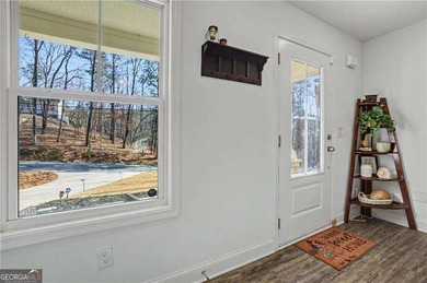 Enjoy peaceful living in this charming 2-bedroom, 2-bath home on The Highlands Course at Lake Arrowhead in Georgia - for sale on GolfHomes.com, golf home, golf lot