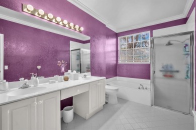 WAKE UP TO SERENE GARDEN VIEWS & INDULGE IN RESORT STYLE on TPC Eagle Trace in Florida - for sale on GolfHomes.com, golf home, golf lot