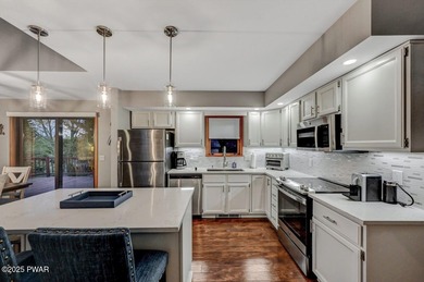 Experience the perfect blend of modern luxury and serene on The Hideout Golf in Pennsylvania - for sale on GolfHomes.com, golf home, golf lot