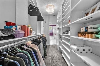 WAKE UP TO SERENE GARDEN VIEWS & INDULGE IN RESORT STYLE on TPC Eagle Trace in Florida - for sale on GolfHomes.com, golf home, golf lot