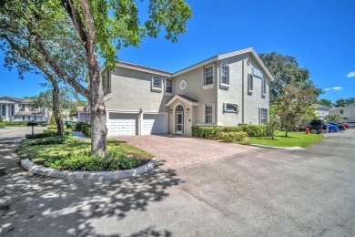 WAKE UP TO SERENE GARDEN VIEWS & INDULGE IN RESORT STYLE on TPC Eagle Trace in Florida - for sale on GolfHomes.com, golf home, golf lot